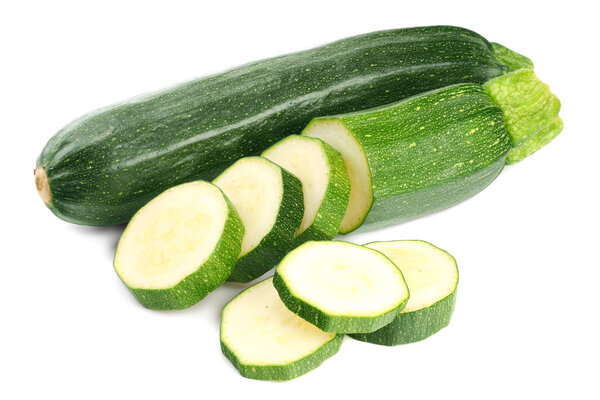 fresh green zucchini with slices isolated on white background 