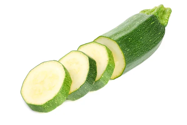 Frische grüne Zucchini mit Scheiben isoliert auf weißem Hintergrund — Stockfoto