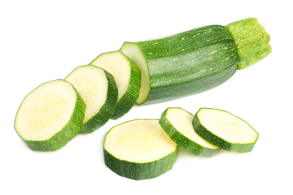 Fresh green zucchini with slices isolated on white background Royalty Free Stock Images