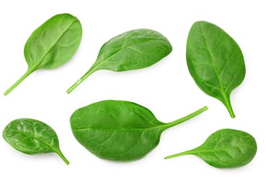 Ispanak yaprakları beyaz arka planda izole edilir. Sağlıklı yiyecekler. Üst görünüm.