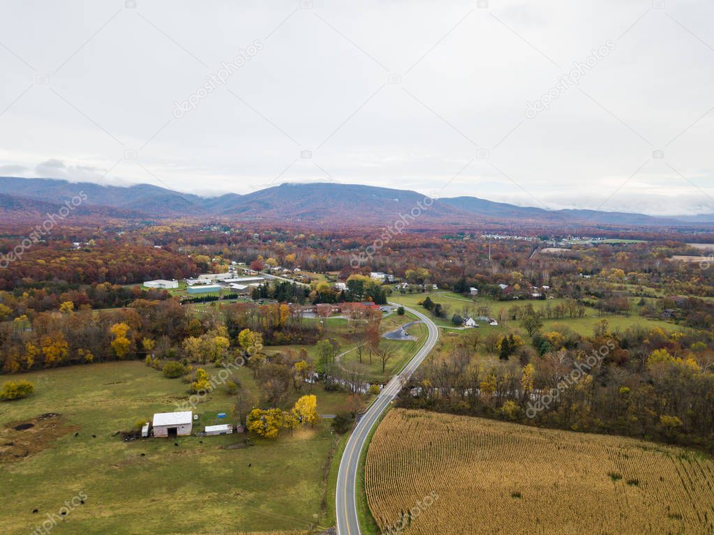 Aerial of the small town of Elkton, Virginia in the Shenandoah Valley with Mountains in the Far Distance