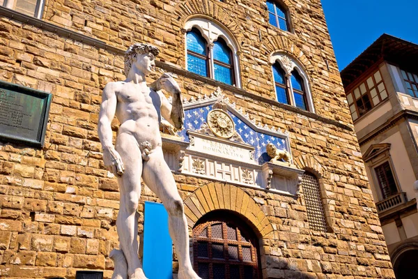 Piazza della Signoria statue of David by Michelangelo and Palazzo Vecchio of Florence view, Tuscany region of Italy