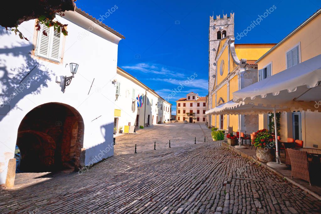 Motovun. Main stone square and church in historic town of Motovu