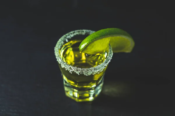 Mexican Gold Tequila Shot Lime Salt Black Stone Table Surface — Stock Photo, Image