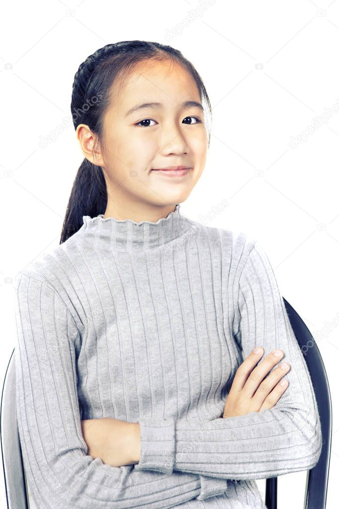 portrait of cheerful asian teenager smiling face on white background