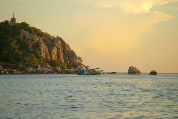 tourist scuba diving boat floaing over plain sea of koh tao island one of most popular traveling destination in southern of thailand