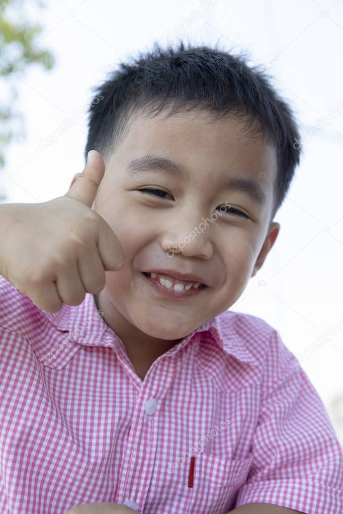 smiling face happiness emotion of asian children 
