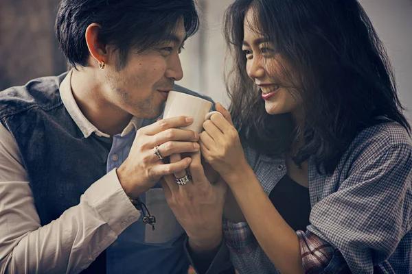 Couples of asian younger man and woman happiness emotion with ho — Stock Photo, Image
