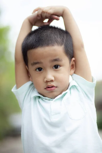 Close up face of asian children boy looking to camera with eye c — Stock Photo, Image