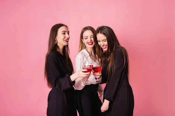 Three women celebrate hen-party having fun laughing and drinking wine. — Stock Photo, Image