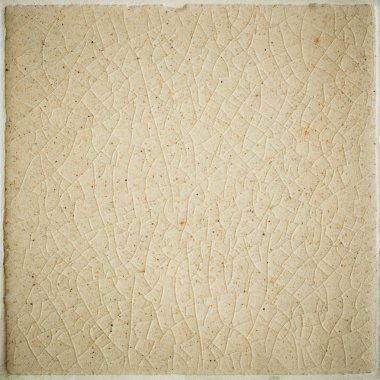 Beyaz krem kaplı fayans üzerindeki çatlakların arka plan ve dokusunu kapat