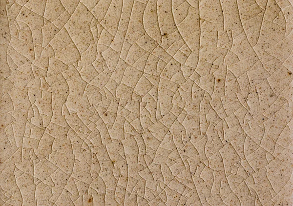 close up background and texture of stretch marks cracked on white cream glazed tile