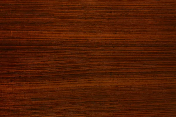 background and texture of rosewood on furniture surface