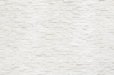 Beyaz dekoratif gerçek taş duvar yüzeyinin modern biçim deseninin arkaplanı ve dokusu