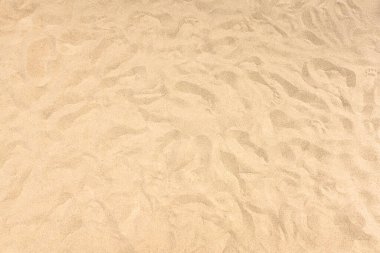 Yazın Phuket, Tayland 'da bir plajda sarı kum deseninin arka planı ve dokusu