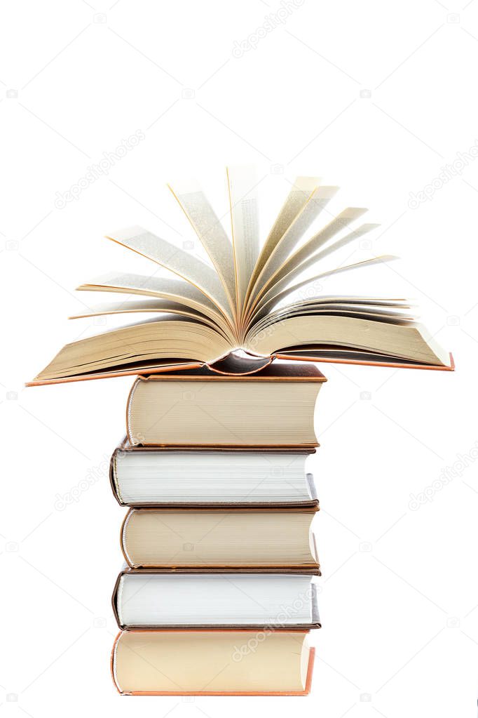 Books in a stack isolated on white background.