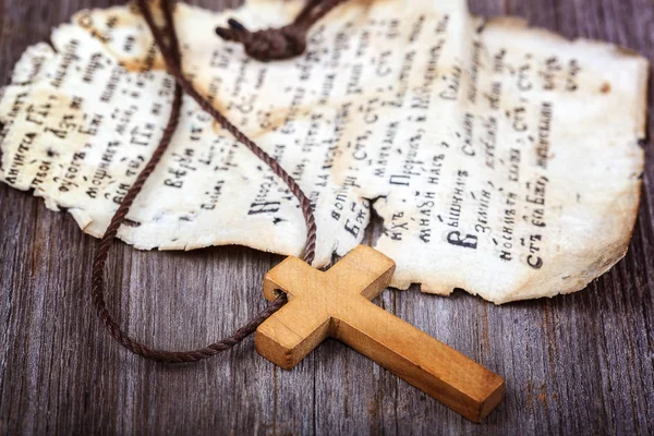 Piece Page Ancient Holy Book Wooden Cross — Stock Photo, Image