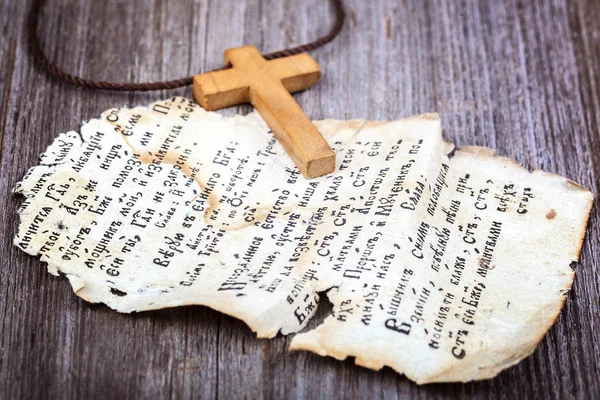 Piece Page Ancient Holy Book Wooden Cross — Stock Photo, Image