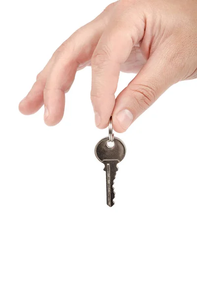 在白色背景下从手上的锁中分离出来的钥匙 — 图库照片