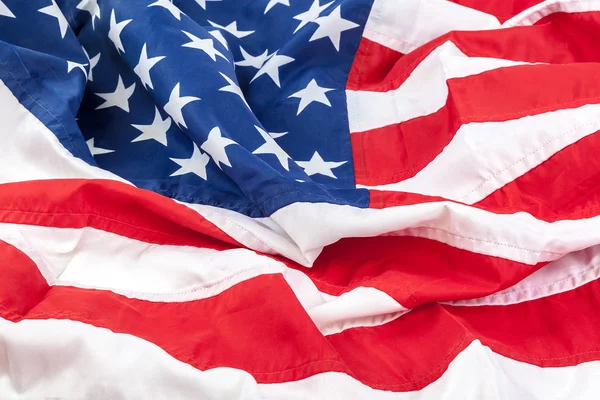 ABD bayrağı arka plan olarak yatırılır.