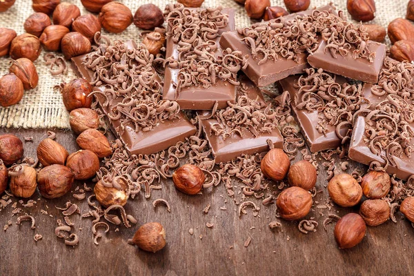 Baldosas Chocolate Canela Nueces Sobre Fondo Madera — Foto de Stock