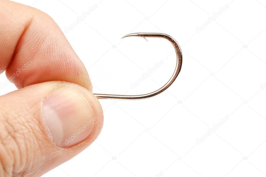 Fishing hook in hand isolated on white background.