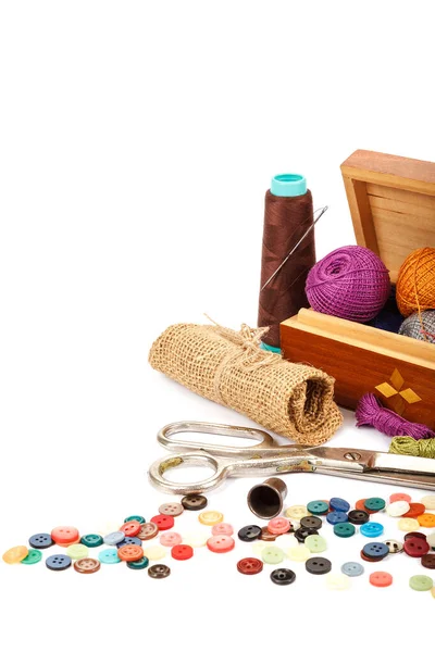 Thread, buttons, scissors on white background. Sewing supplies. — Stock Photo, Image