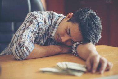 Businessman feeling sick and tired. Businessman who feel stressed out of work