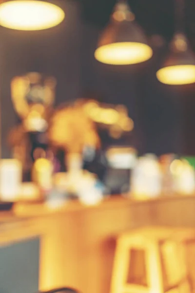 abstract blurry background of coffee cafe shop, out of focus shot, vintage filter image