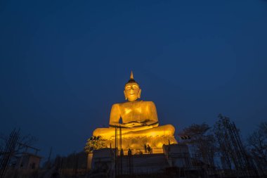 Buddha statue in the temple at the evening 