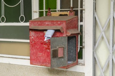 Old vintage mailbox on house