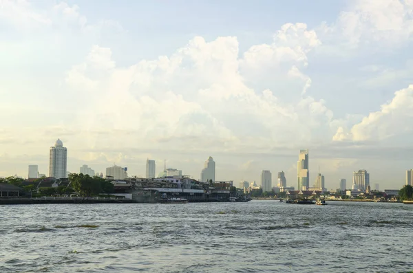 Penang cityscapes with boats on ocean and skyscraper in Malaysia, Asia.