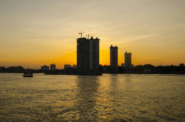 beautiful view of sunset over city and harbor 