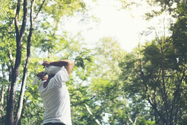 man stands on the background of nature