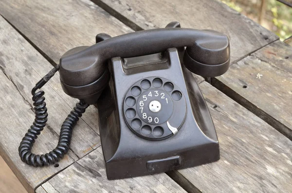 Old Black Phone Wooden Background — Stock Fotó