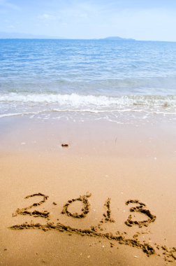beach - konsept tatil arka plan üzerinde numaralar 2013