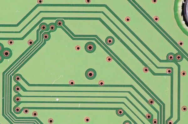 Green computer circuit board closeup