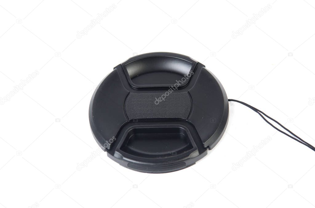 Lens cap on a white background