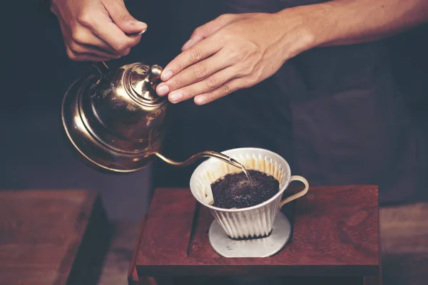 stock image coffee dripping process, vintage filter image