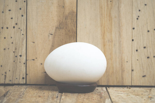 Easter eggs on wooden background