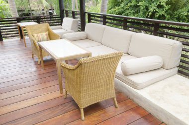 Tables, sofas and chairs in cafe 