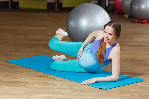 Pregnant Woman Sits Mat Gym Bottle Water Hand Blurred Background — Stock Photo, Image