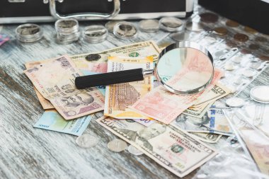 Farklı Amerikan Doları ve Hint JT, nümismatik kavramı