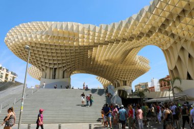 SEVILLE, SPAIN - JUNE 14, 2018: Metropol Parasol (Setas de Sevilla) viewpoint of the city of Seville, Spain clipart
