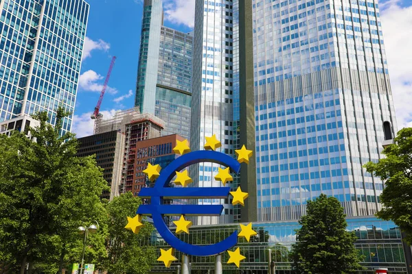 Business and finance concept with giant Euro sign at European Central Bank headquarters in the morning, business district in Frankfurt am Main, Germany — Stock Photo, Image