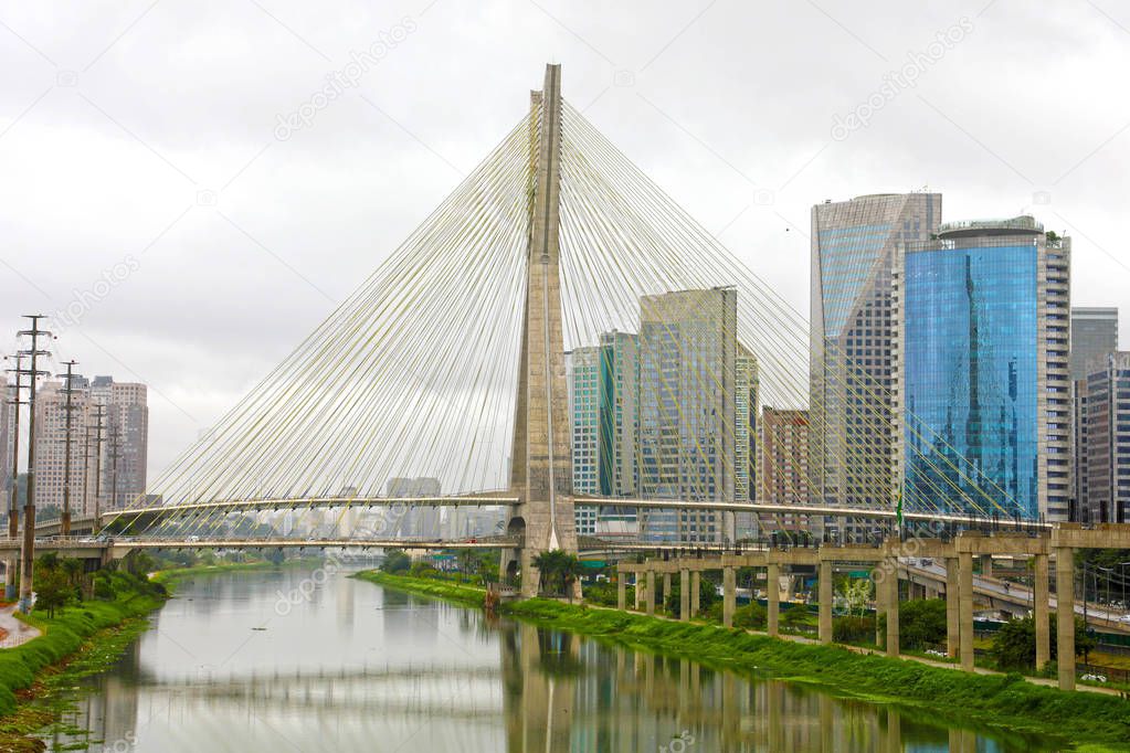 Sao Paulo city landmark Estaiada Bridge reflex in Pinheiros river, Sao Paulo, Brazil