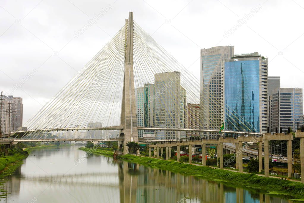 Sao Paulo city landmark Estaiada Bridge reflex in Pinheiros river, Sao Paulo, Brazil