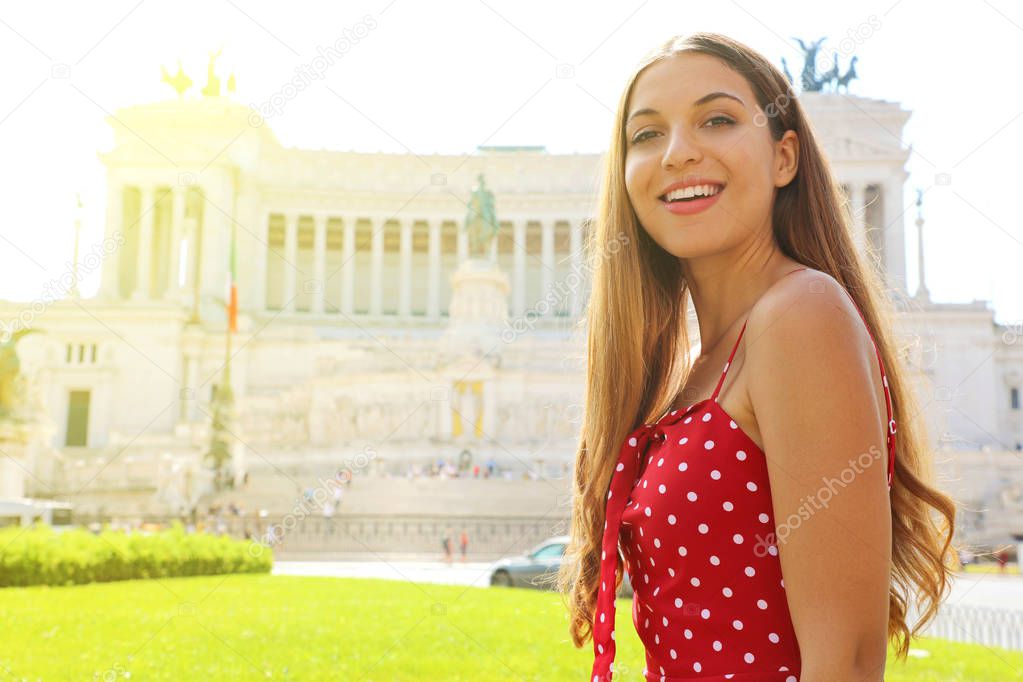 Travel in Italy. Beautiful young woman on the Spanish Steps famous landmark of Rome. Summer holidays in Europe.Smiling beautiful tourist girl in Venice square famous landmark of Rome. Summer holidays in Italy.