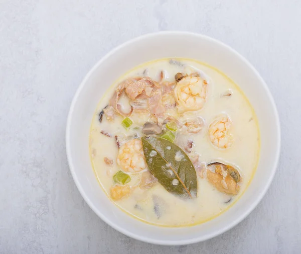 Creamy sea food soup in white plate — Stock Photo, Image
