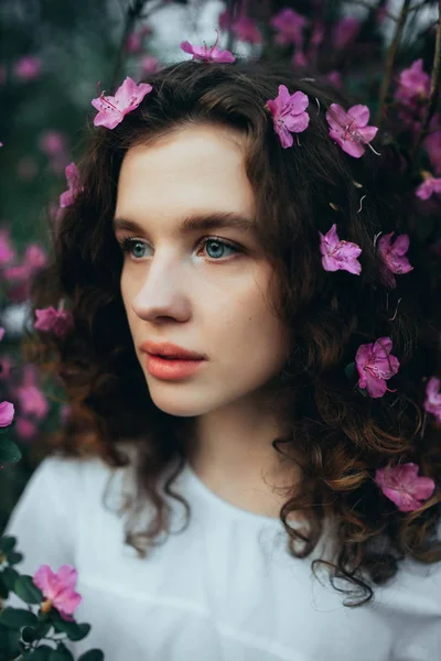 the girl and her flowers in hair